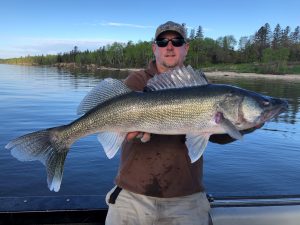 Donovan Pearase of Blackwater cats with a master angler walleye