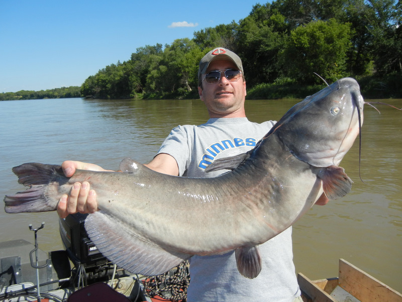 Manitoba catfish guide with a large catch