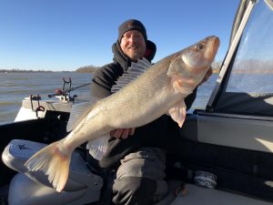 Angler with a Trophy 12 lbs walleye